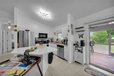 Welcome to 4115 SW 1st Ave, Cape Coral, FL 33914! This unique - photo 5