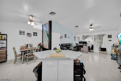 Welcome to 4115 SW 1st Ave, Cape Coral, FL 33914! This unique - photo 7