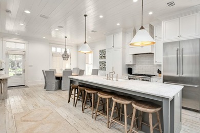 Ample entertaining space and coastal casual elegance combine in - photo 11