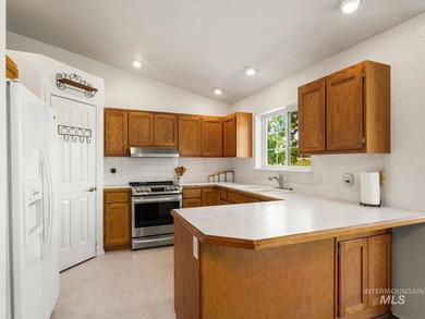 Nestled at the base of Emmett's desirable southeast hills, this - photo 11