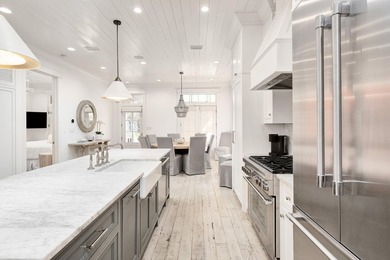 Ample entertaining space and coastal casual elegance combine in - photo 12