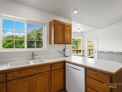Nestled at the base of Emmett's desirable southeast hills, this - photo 13