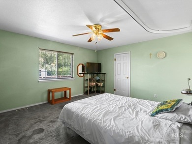 Nestled at the base of Emmett's desirable southeast hills, this - photo 15