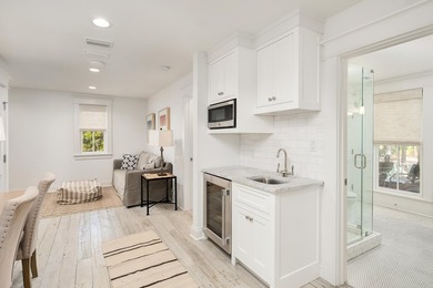Ample entertaining space and coastal casual elegance combine in - photo 16