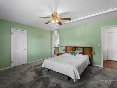 Nestled at the base of Emmett's desirable southeast hills, this - photo 16