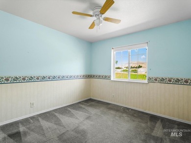 Nestled at the base of Emmett's desirable southeast hills, this - photo 23
