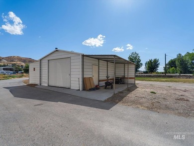 Nestled at the base of Emmett's desirable southeast hills, this - photo 25
