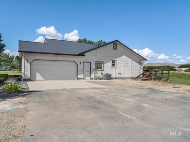 Nestled at the base of Emmett's desirable southeast hills, this - photo 26