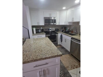 Beautifully updated first-floor 1-bedroom, 1.5-bath condo - photo 3