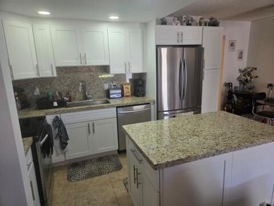 Beautifully updated first-floor 1-bedroom, 1.5-bath condo - photo 5