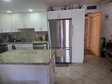 Beautifully updated first-floor 1-bedroom, 1.5-bath condo - photo 6