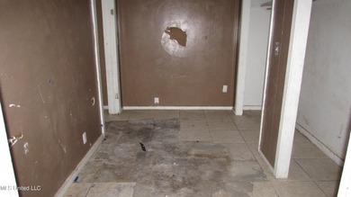 Fixer upper close to town, corner lot with newer metal roof - photo 7