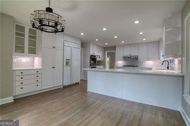 This stunning contemporary home offers modern elegance and - photo 9