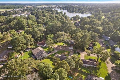Welcome to this charming 3-bedroom, 2-bath home nestled in the - photo 17