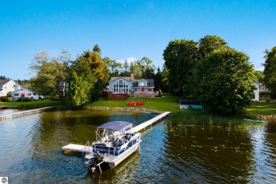 Lake Mitchell Home For Sale in Cadillac Michigan