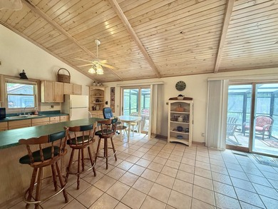 Surrounded by towering pines and overlooking a private pond - photo 6