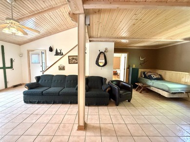Surrounded by towering pines and overlooking a private pond - photo 9