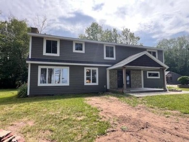 St. Marys River Home For Sale in Sault Sainte Marie Michigan