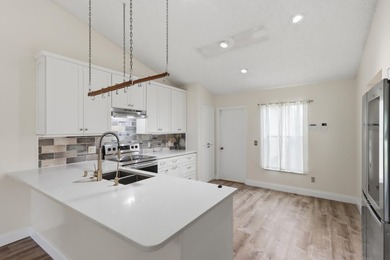 Welcome to this lovely single-story residence located in a - photo 18