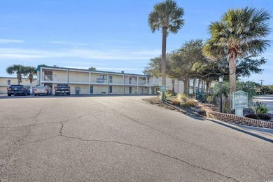 Located on the pristine sands of Litchfield Beach, this charming - photo 1