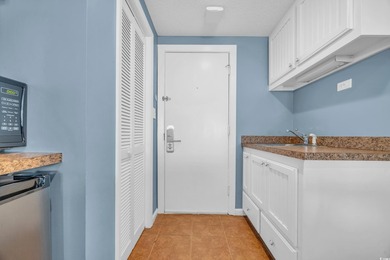 Located on the pristine sands of Litchfield Beach, this charming - photo 4