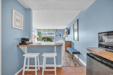 Located on the pristine sands of Litchfield Beach, this charming - photo 6