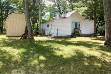 Your waterfront home awaits you!! This quaint river home located - Lake Home Sale Pending in Winamac, Indiana