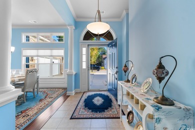 Experience the pinnacle of coastal luxury in this elegantly