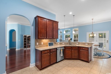 Experience the pinnacle of coastal luxury in this elegantly