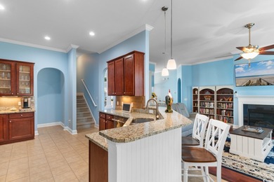 Experience the pinnacle of coastal luxury in this elegantly