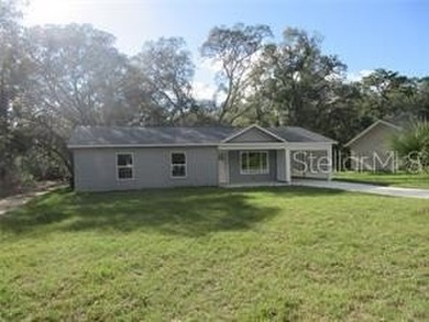 BRAND NEW 3 BEDROOM 2 BATH HOME WITH AN ATTACHED 1 CAR CARPORT - photo 1