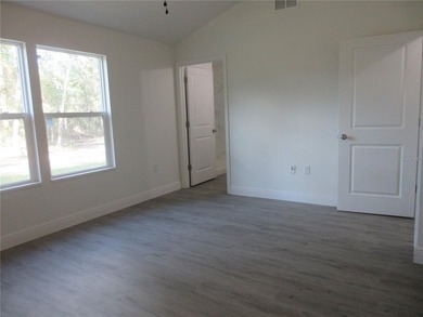 BRAND NEW 3 BEDROOM 2 BATH HOME WITH AN ATTACHED 1 CAR CARPORT - photo 3