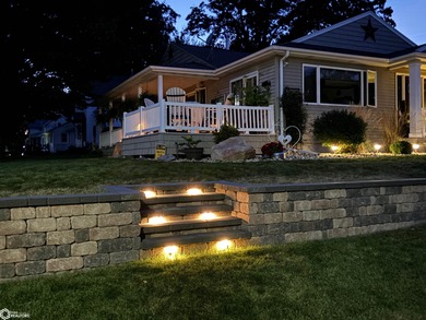 Experience stunning lake views from this beautiful 4-bedroom - photo 7