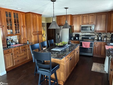 Experience stunning lake views from this beautiful 4-bedroom - photo 9
