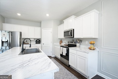 Welcome home to this beautifully maintained two-story residence - photo 14