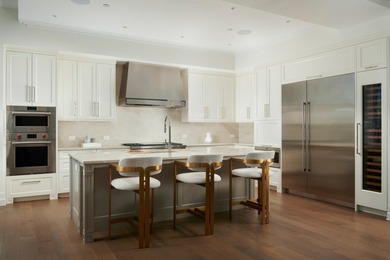 A rare turnkey 3 bedroom + den residence with one of the most - photo 14