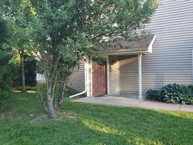 One-bedroom condo with an attached one car garage, outside - photo 4