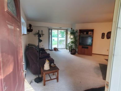 One-bedroom condo with an attached one car garage, outside - photo 5