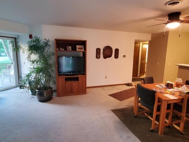 One-bedroom condo with an attached one car garage, outside - photo 8