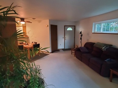 One-bedroom condo with an attached one car garage, outside - photo 9