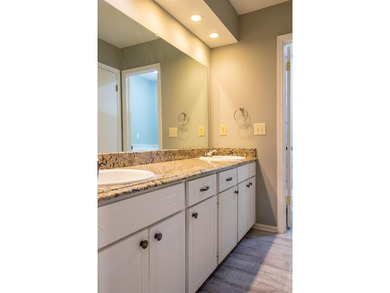 Price Adjustment! Welcome to this thoughtfully renovated - photo 17