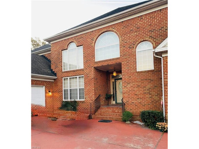 Spacious 4-bedroom, 3-bathroom brick home offering 4,281 square
