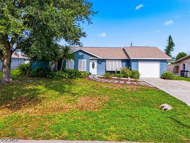 Welcome to this 3-bedroom, 2-bath home located in the desirable - photo 1