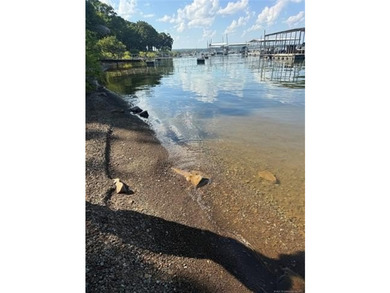 It is rare to find a waterfront lot around the lake but here is - photo 1