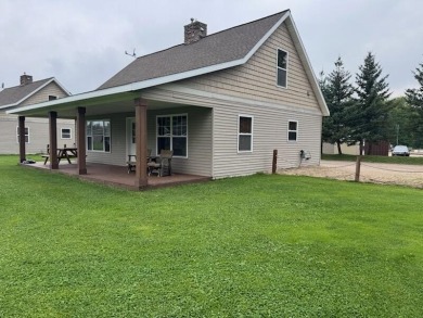 Big Manistique Lake Condo For Sale in Mcmillan Michigan