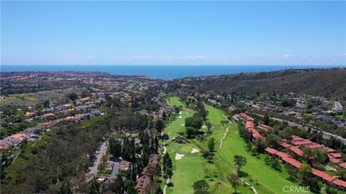 Location, Location, Location! Situated on second fairway in the - photo 1