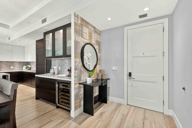 Step into the epitome of modern luxury with Unit 611 at Tower - photo 3
