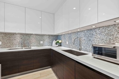 Step into the epitome of modern luxury with Unit 611 at Tower - photo 10