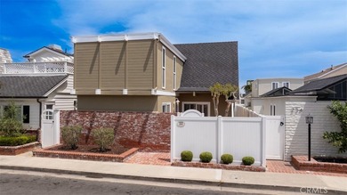 This meticulously maintained 4-bedroom, 2-bath Newport Shores - photo 1