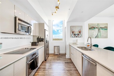 PENTHOUSE UNIT -  & SHORT TERM RENTAL FRIENDLY! Situated in the - photo 9